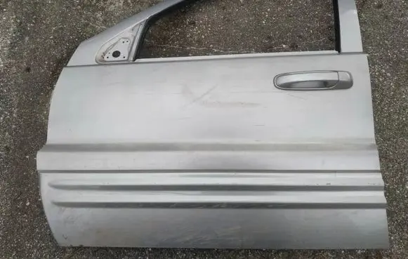 Jeep Grand Cherokee (WJ) Front door pilkos