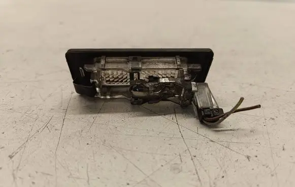 Volkswagen Touran II Number plate light 5N0943021B