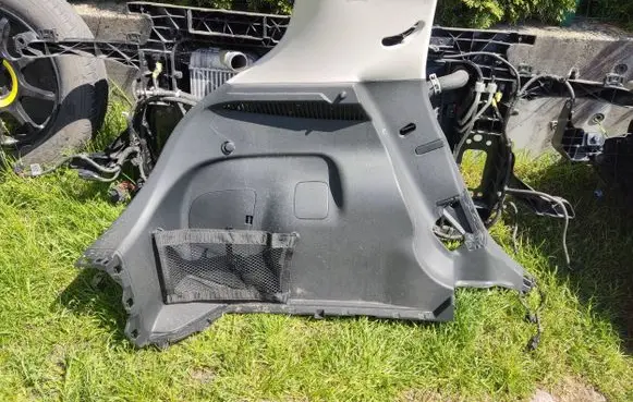Nissan Leaf II (ZE1) Trunk/boot lower side trim panel 49515SHOB