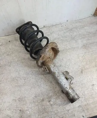 Front shock absorber with coil spring