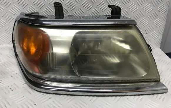 Mitsubishi Pajero Sport I Headlight/headlamp 10087415