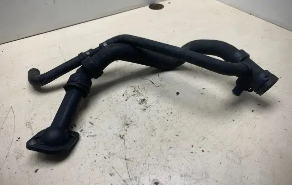 Volkswagen PASSAT B5.5 Engine coolant pipe/hose 038121121B 06B121121