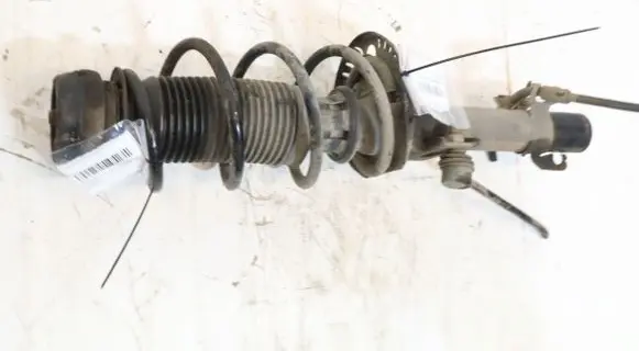 Front shock absorber with coil spring