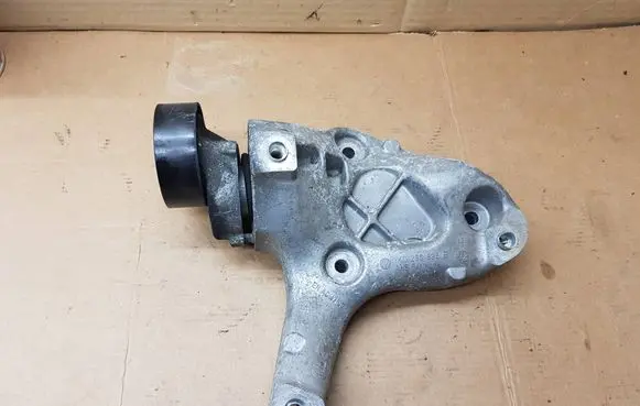 Volkswagen Eos A/C compressor mount bracket 1K0260885B