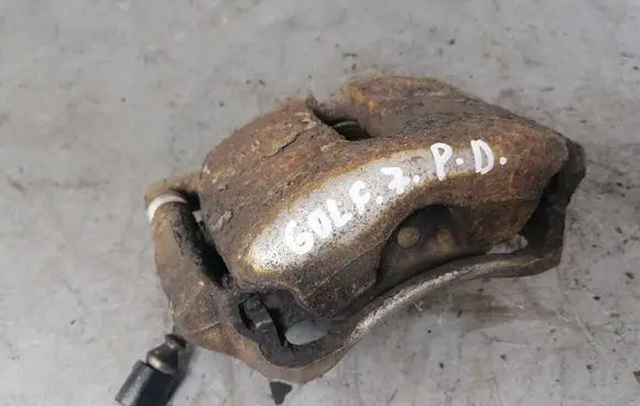 Volkswagen Golf VII Front brake caliper