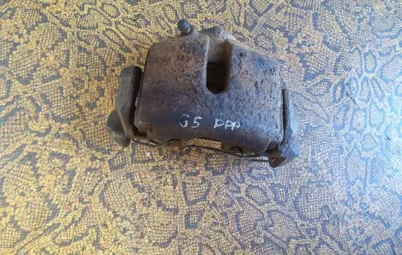 Volkswagen Golf V Front brake caliper