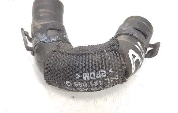 Volkswagen PASSAT B8 Engine coolant pipe/hose 04L121058Q