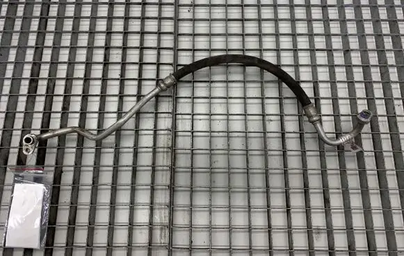 Jaguar XF Air conditioning (A/C) pipe/hose JX73-19N601-BA