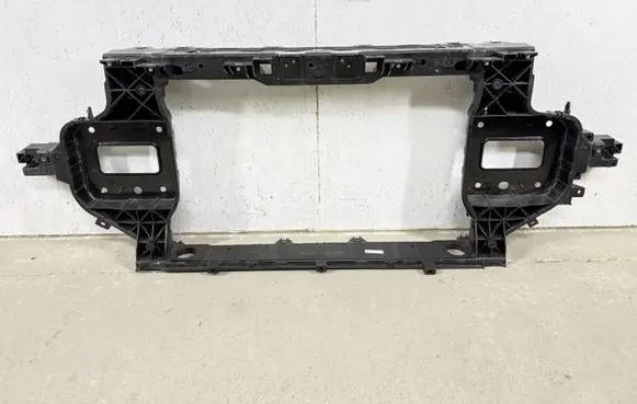 Radiator support slam panel