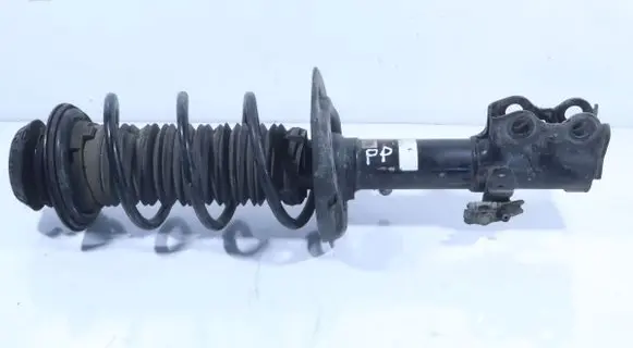 Toyota Yaris XP210 Front shock absorber with coil spring 48510K0070