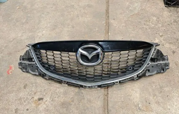 Mazda CX-5 Front bumper upper radiator grill KD4550712