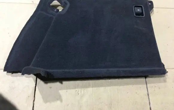 Trunk/boot lower side trim panel