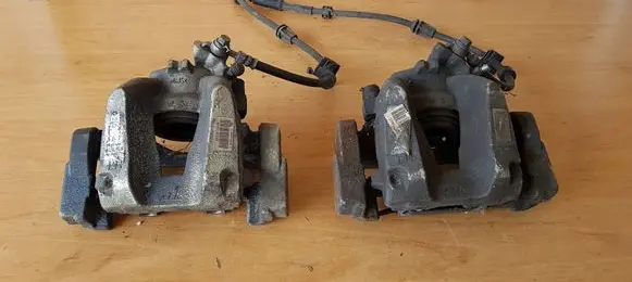 Citroen C4 Grand Picasso Front brake caliper 9807197280