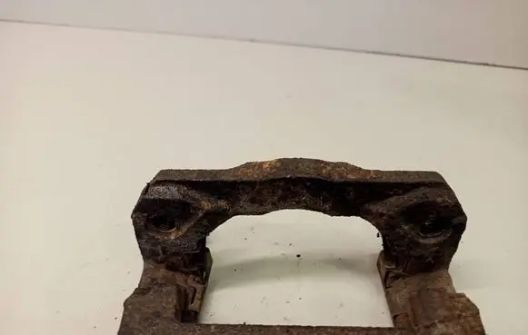 Nissan Pathfinder R51 Brake caliper pad carrier rear 
