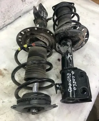Opel Corsa F Front shock absorber with coil spring 9837413780