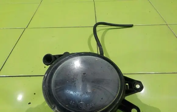 Volvo C70 Front fog light 0305065002 LEWY