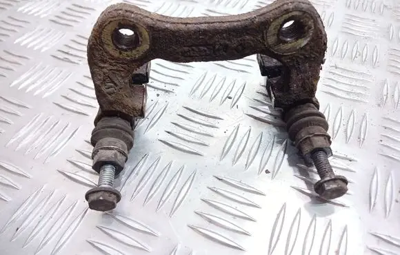 Renault Megane II Brake caliper pad carrier rear 