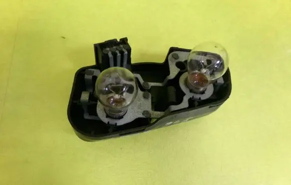 BMW 3 E46 Tail light bulb cover holder