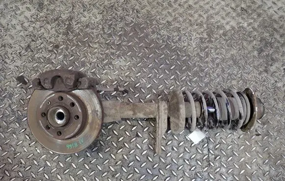 Chevrolet Lanos Front shock absorber with coil spring 
