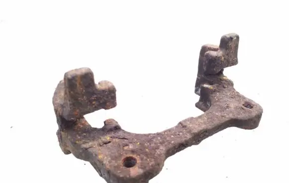 Nissan Primera Brake caliper pad carrier rear 