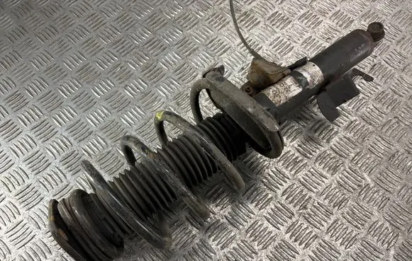 Front shock absorber with coil spring