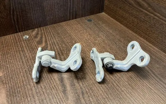 Front door lower hinge