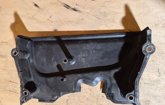Mazda 323 F Timing belt guard (cover) 7501E0511