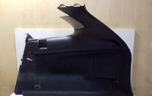 Trunk/boot lower side trim panel