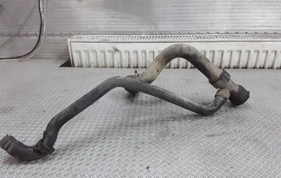 Volkswagen PASSAT B5 Engine coolant pipe/hose 8D0121055F
