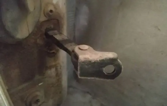 Rear door check strap stopper