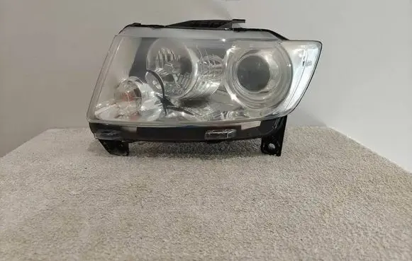 Jeep Grand Cherokee Headlight/headlamp 55079409AH M149687