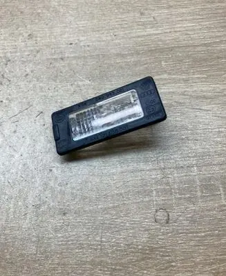 Volkswagen Tiguan Number plate light 5N0943021