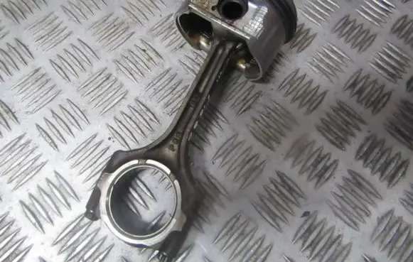 Piston with connecting rod