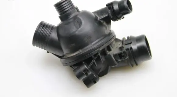 Thermostat/thermostat housing