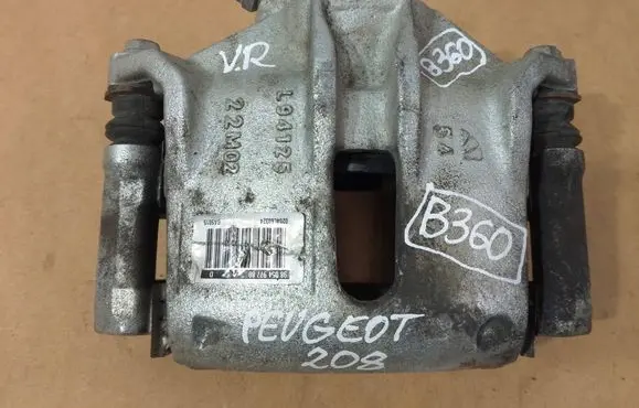 Peugeot 208 Front brake caliper 9805497780