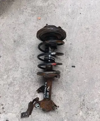 Nissan Primera Front shock absorber with coil spring