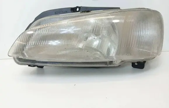 Peugeot 106 Headlight/headlamp 88202144