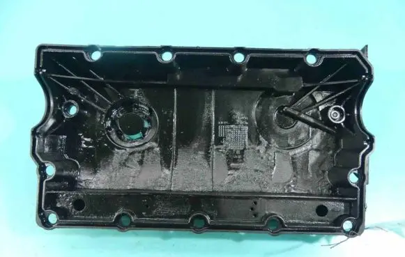 Rocker cam cover