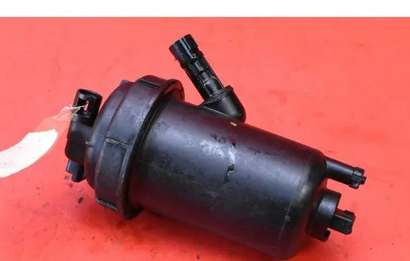 Opel Astra H Fuel filter housing 