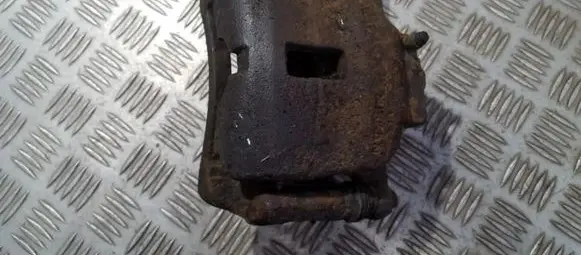Nissan Almera N16 Front brake caliper