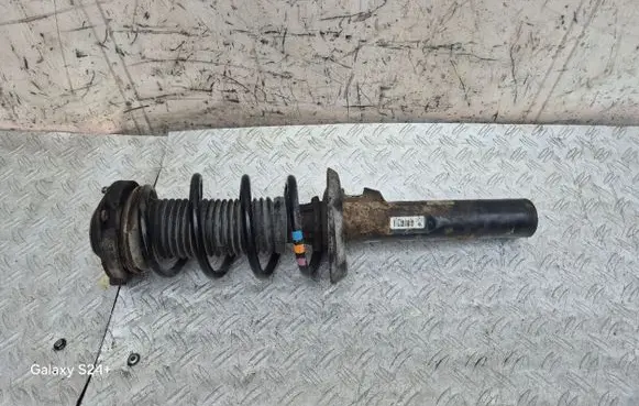 Volkswagen Golf Plus Front shock absorber with coil spring 1T0413031FM