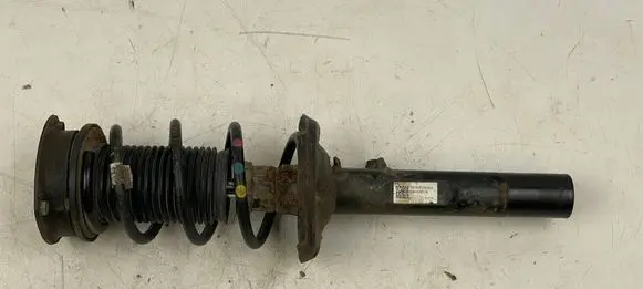 Seat Leon (5F) Front shock absorber with coil spring 5Q0413023FM