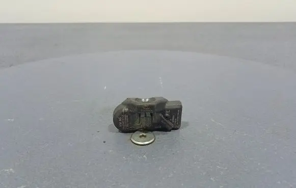Volkswagen Touareg II Tire pressure sensor 5Q0907275D