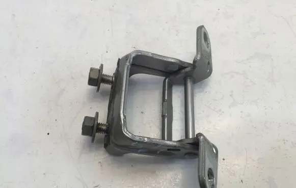 Rear door upper hinge