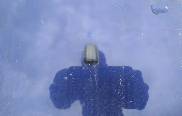 Windshield washer spray nozzle