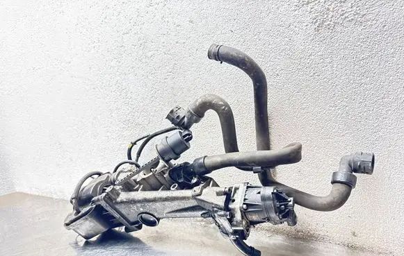 Opel Corsa D EGR valve cooler 55566052 0765592