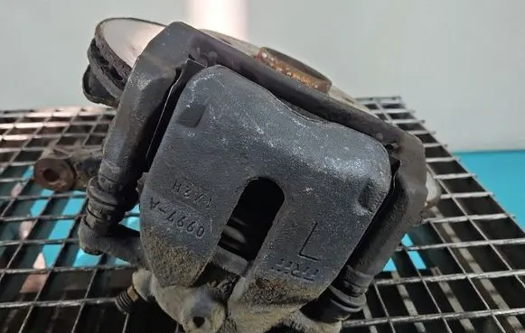 Suzuki Swift I Front brake caliper IMPRK1566424