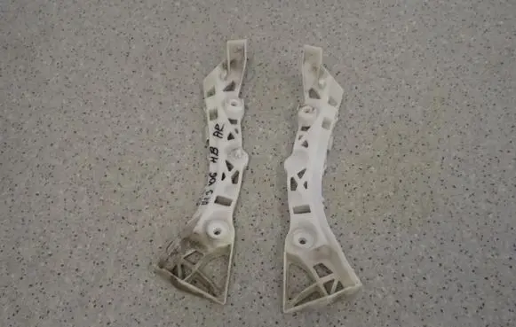 Mazda 3 I Front bumper mounting bracket 