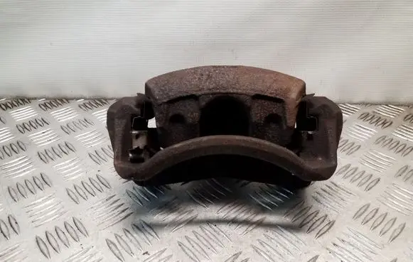 Nissan Juke I F15 Front brake caliper
