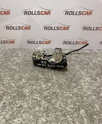 Tail light bulb cover holder